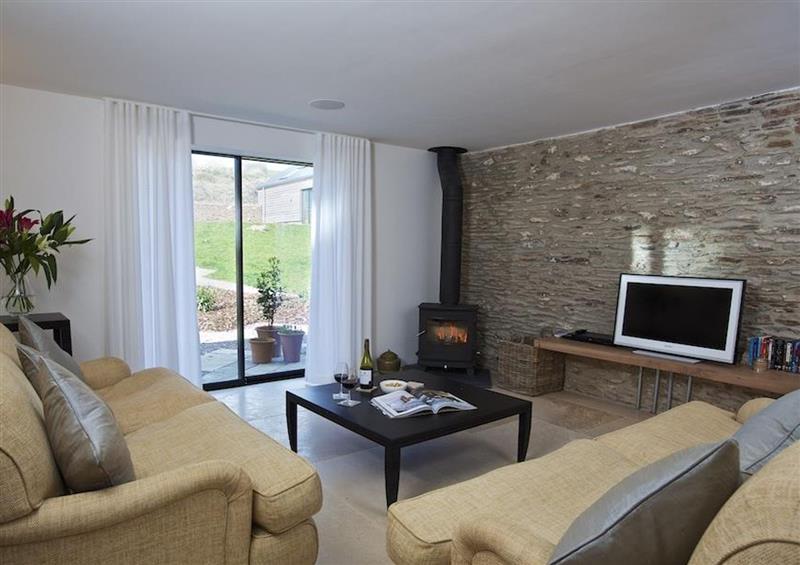 Relax in the living area at The Milking Shed, Bantham