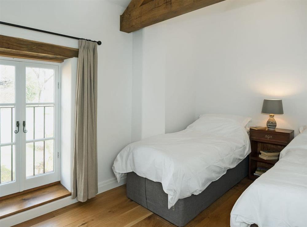 Comfortable twin bedroom at The Mill House in Aisholt, near Bridgwater, Somerset