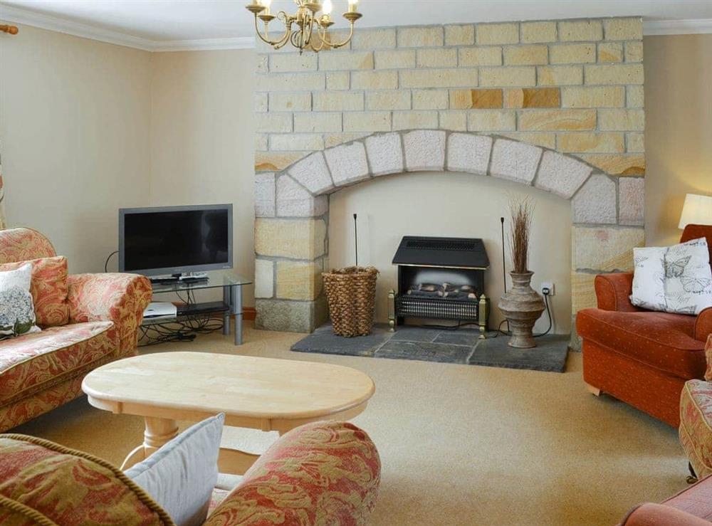 Welcoming living area at The Mill House in Bamburgh, Northumberland., Great Britain