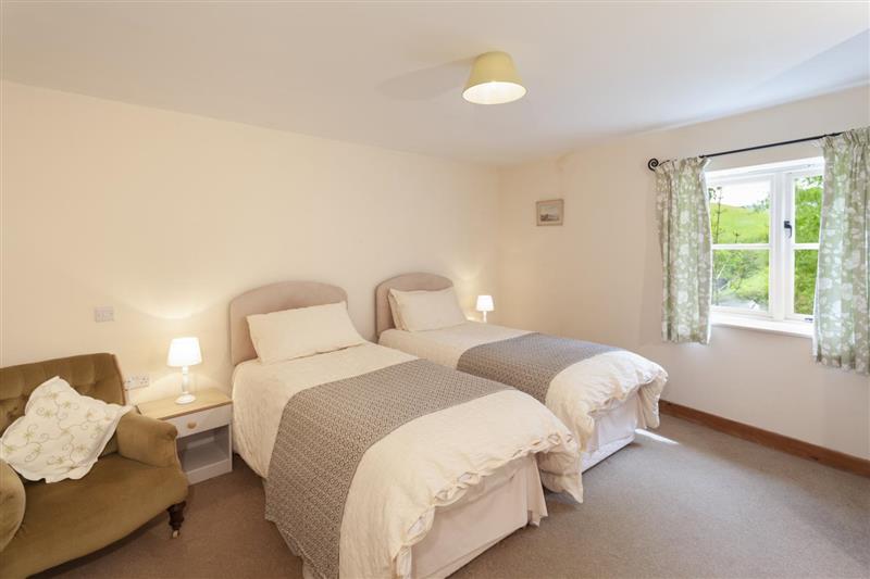 Twin bedroom at The Mill House, Bampton