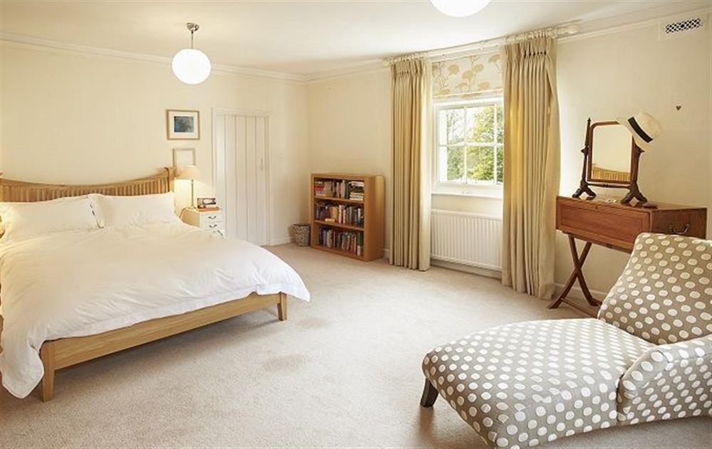 First floor:  Double bedroom with 5' bed at The Mill House, Buxton with Lamas