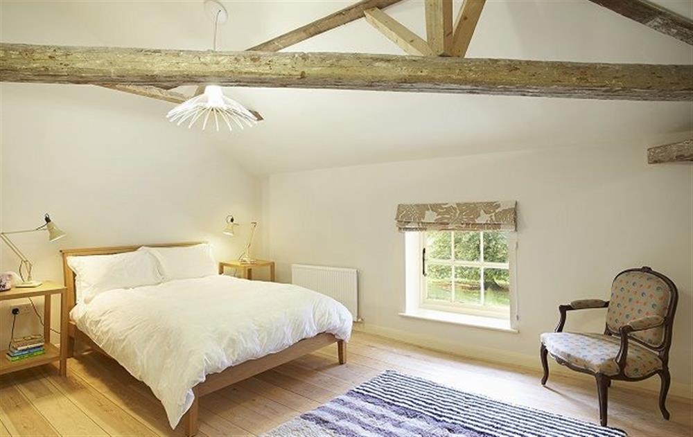 Second floor:  Double bedroom with 5' bed at The Mill House, Buxton with Lamas