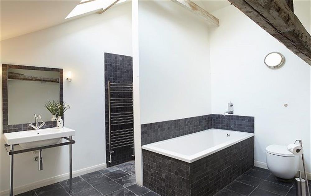 Second floor:  Family bath and shower room at The Mill House, Buxton with Lamas