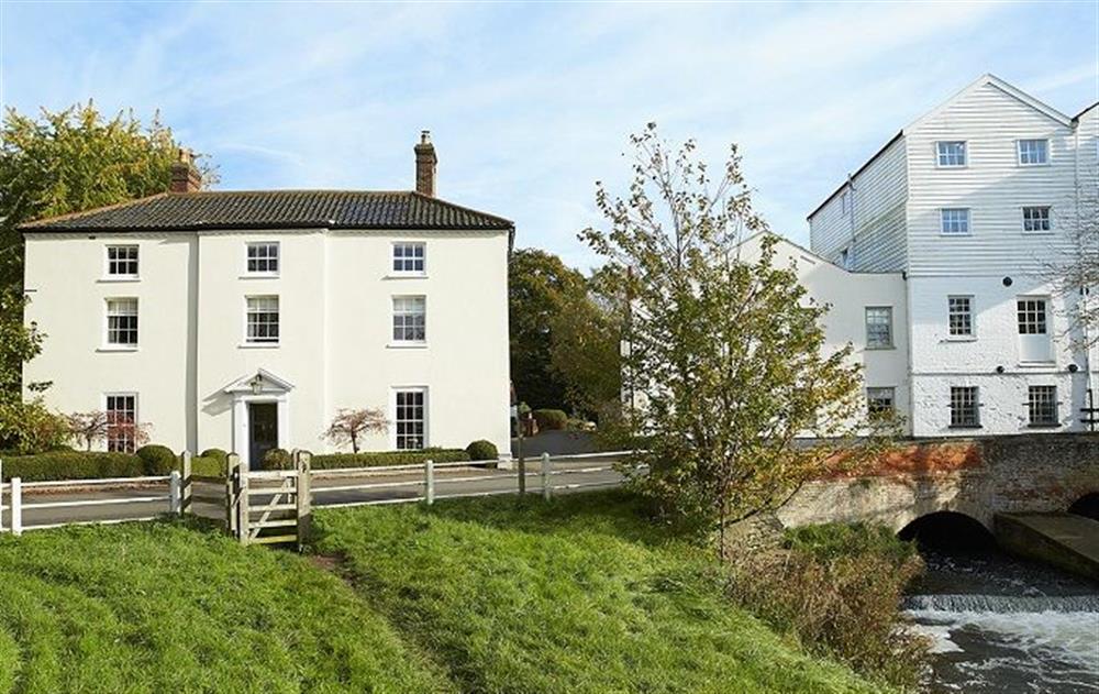 This impressive property overlooks the River Bure and sits alongside the large mill building at The Mill House, Buxton with Lamas