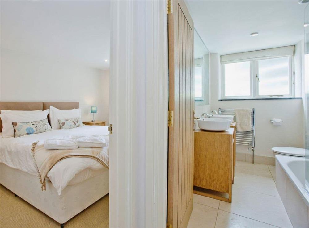 Double bedroom and bathroom at The Mill House in Mount, Nr Bodmin, Cornwall., Great Britain