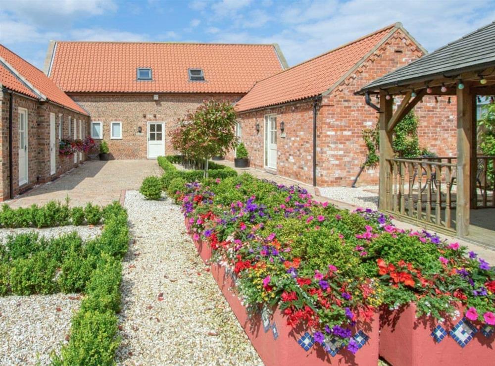 Communal courtyard/garden at The Mill House in North Somercotes, near Louth, Lincolnshire