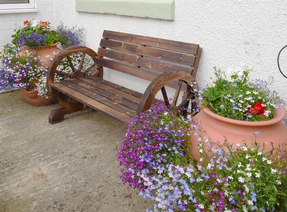 Pretty out door seating area at The Miners Cottage in Loftus, near Saltburn-by-the-Sea, Cleveland