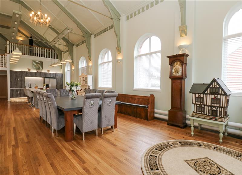 Relax in the living area at The Miners Hall Retreat, Stanley