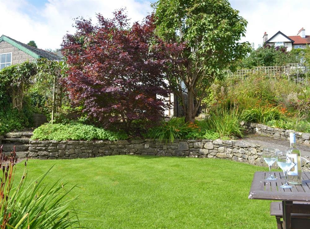 Peaceful enclosed terraced garden at The Moorings in Grange-over-Sands, Cumbria