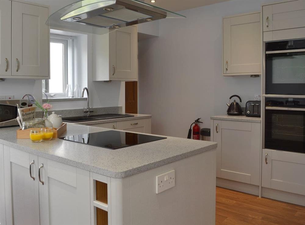 Well-equipped kitchen at The Moorings in Grange-over-Sands, Cumbria