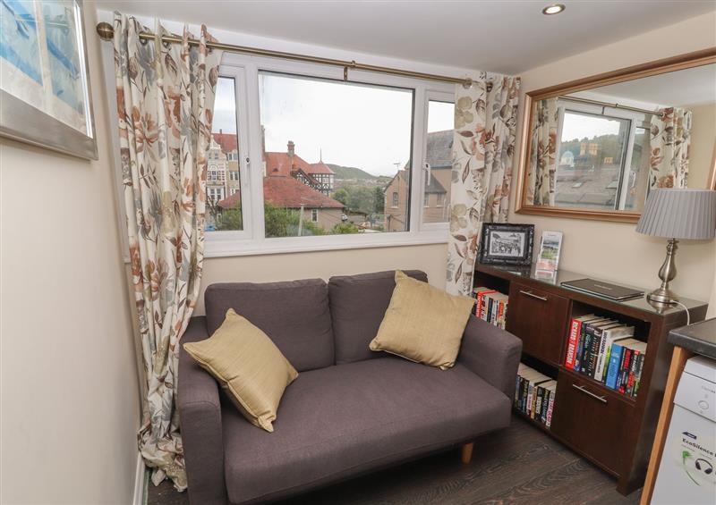 Relax in the living area at The Mountain View Suite, Llandudno