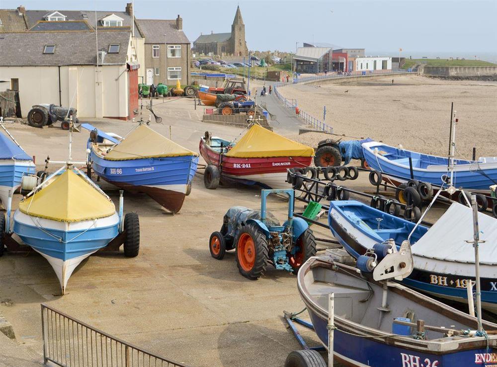 Boats by the beach at The Mules in Newbiggin-by-the-Sea, near Morpeth, Northumberland