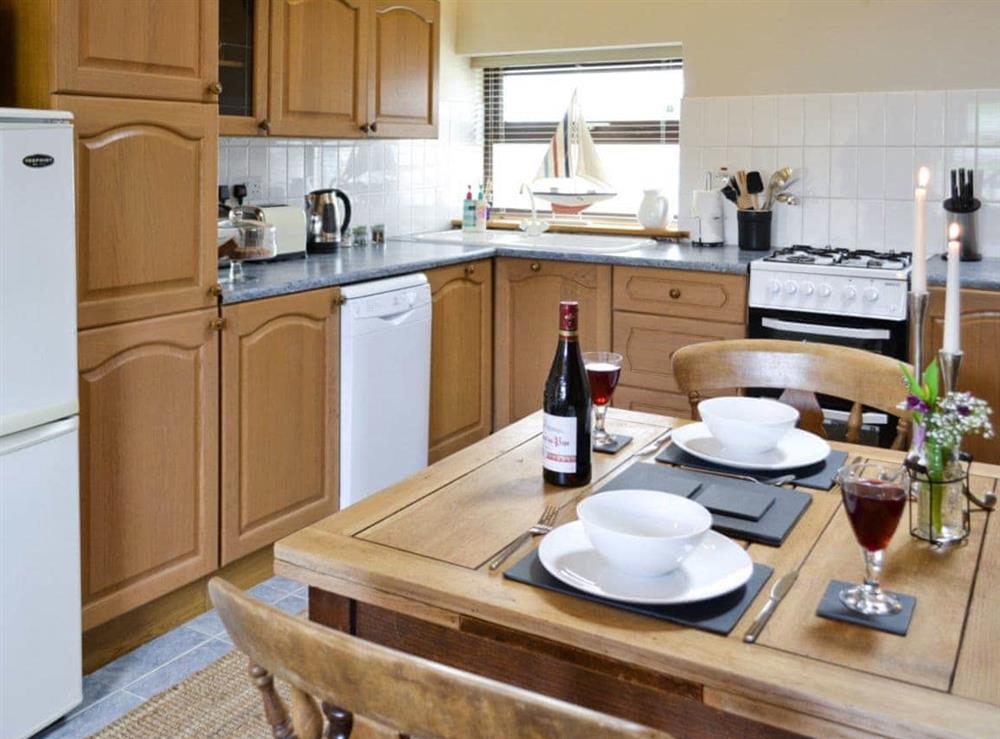 Kitchen/diner at The Nook in Amroth, near Pendine, Dyfed