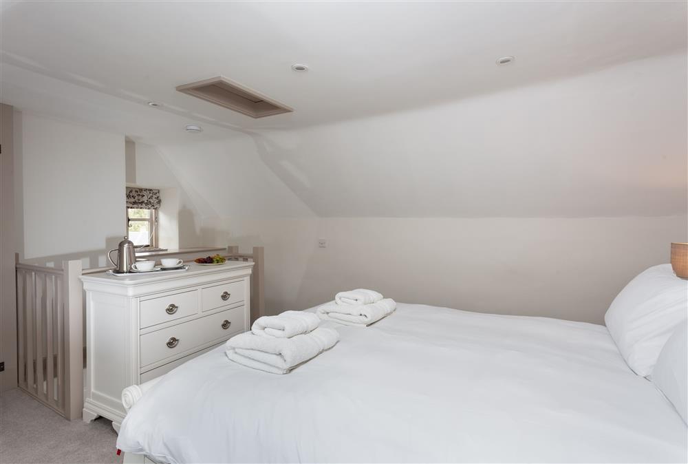 Bedroom three with a 5’ king-size bed at The Nook, Guiting Power