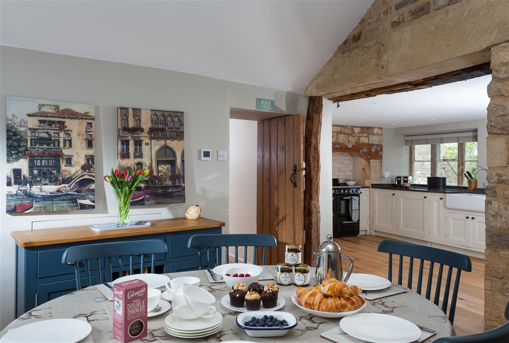 Open-plan dining area leading to the beautiful kitchen at The Nook, Guiting Power