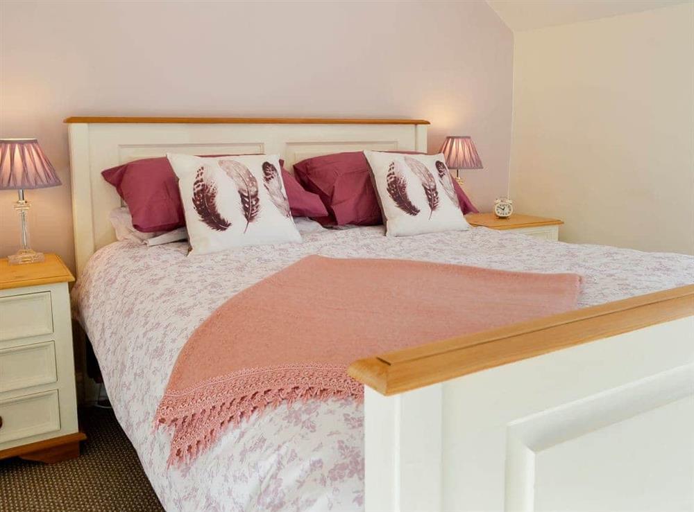 Relaxing bedroom with kingsize bed at The Nook in Mealsgate, near Wigton, Cumbria