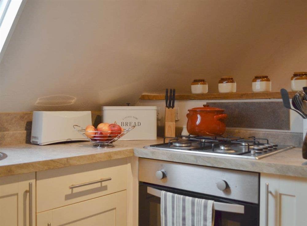 Compact yet well equipped kitchen area at The Nook in Westfield, near Battle, East Sussex