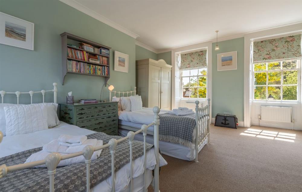 Bedroom three with twin 3’ single beds and en-suite bathroom at The Normans, Wells-next-the-Sea