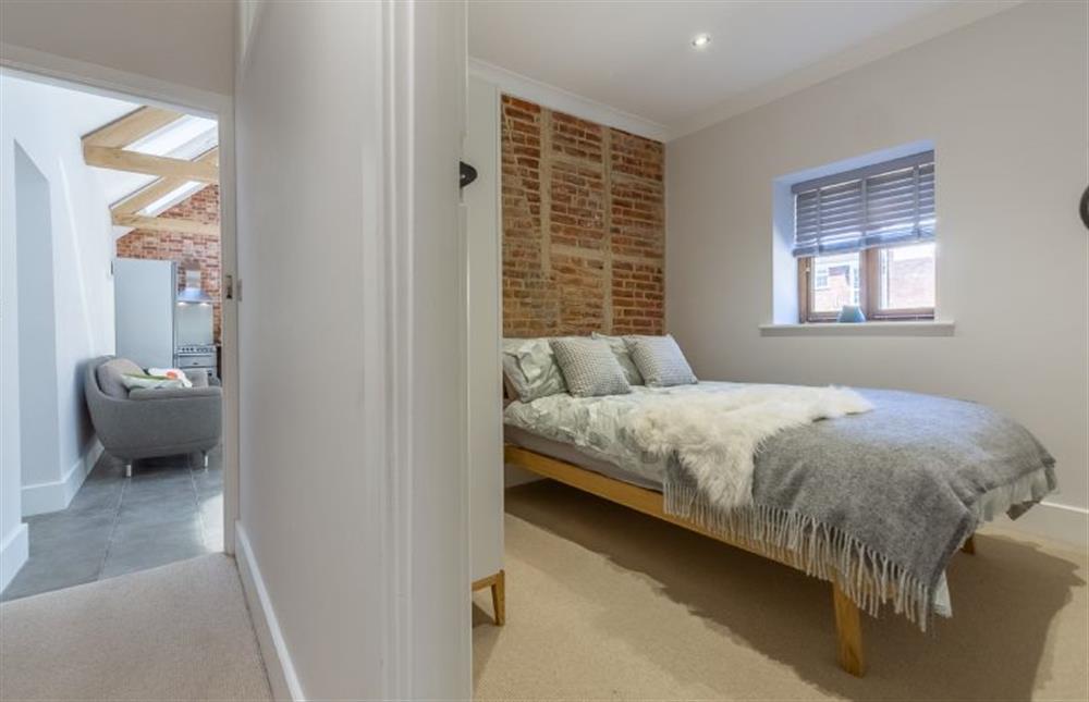 Ground floor: Hallway leading from sitting area to bedroom two at The Nurseries, Syderstone near Kings Lynn