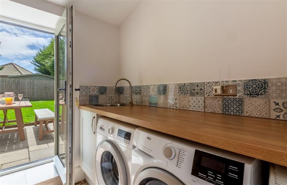 Ground floor: Utility room with washing machine and condenser dryer at The Nurseries, Syderstone near Kings Lynn