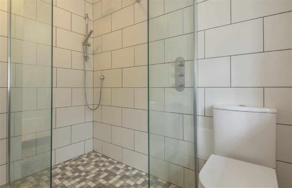 Ground floor: Wet room with overhead rainfall shower and hand held shower