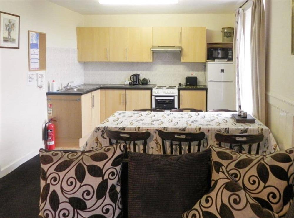 Well-equipped kitchen and convenient dining area at The Nursery in South Lochaweside, Argyll