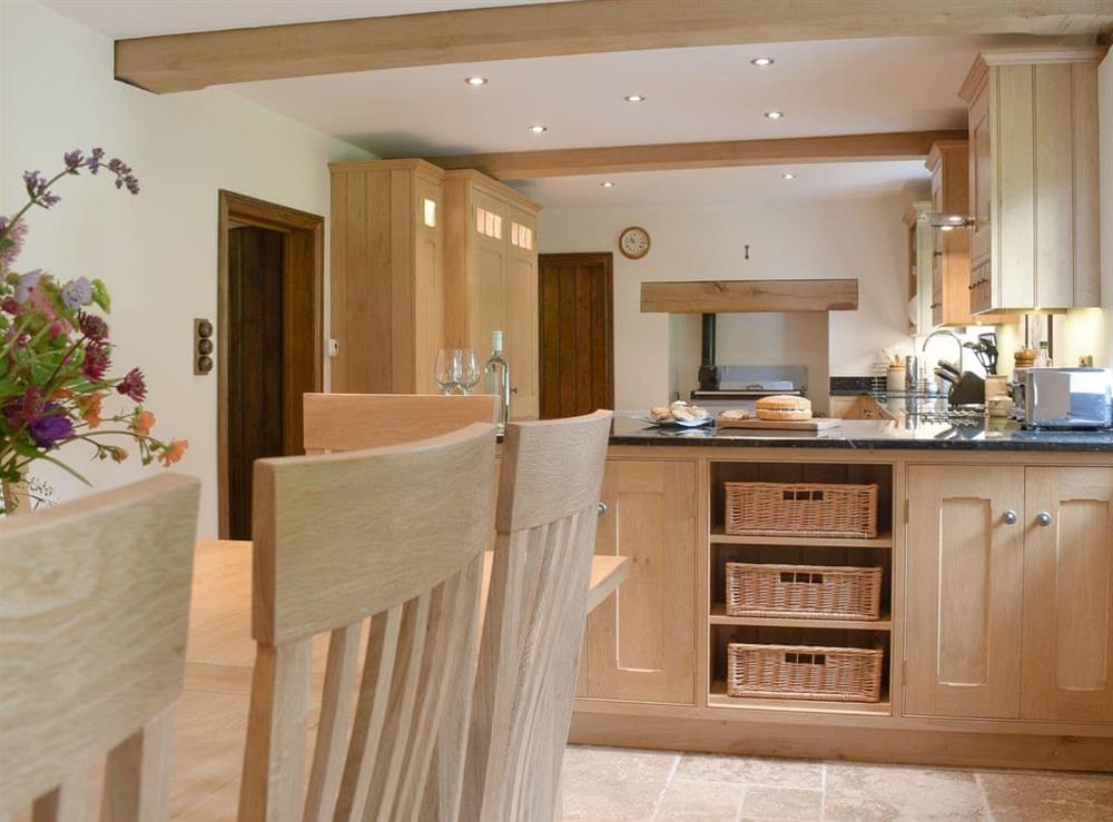 Well equipped kitchen/ dining room at The Oak in Newchurch, near Hay-on-Wye, Powys