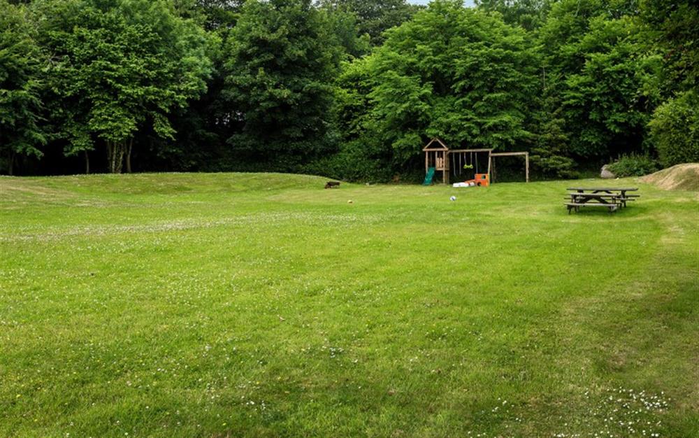 The large communal grounds and play area at The Oaks in Chillington