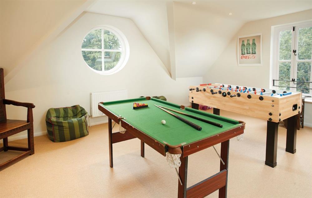 Games room with table football and pool table at The Oaks, Inwood
