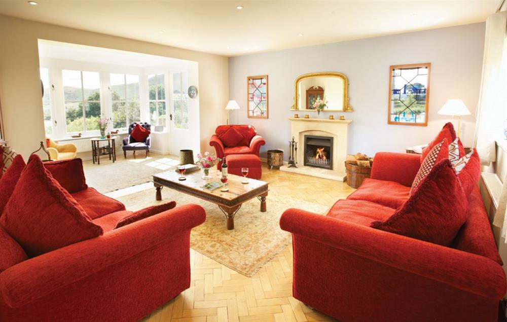 Sitting room with large bay window with extensive views at The Oaks, Inwood