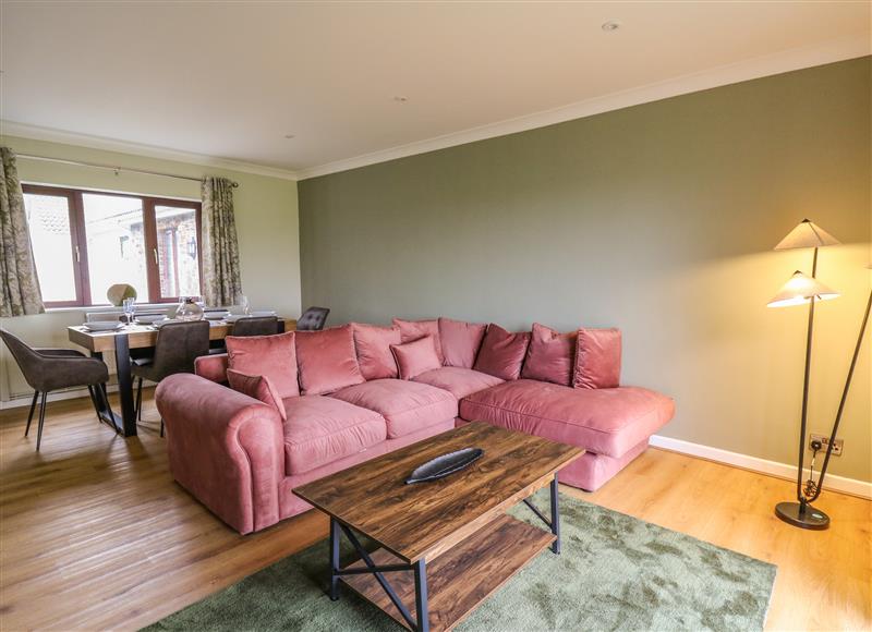 Relax in the living area at The Oaks, St Clears