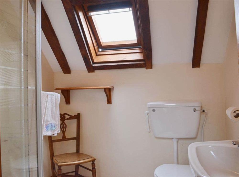 The twin room boasts an en-suite shower room at The Oast House in Whatmore, near Tenbury Wells, Shropshire