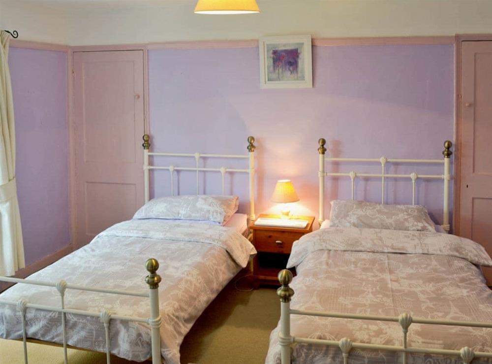 Twin bedroom with additional single bed at The Officers House in Bacton-on-Sea, Norwich, Norfolk