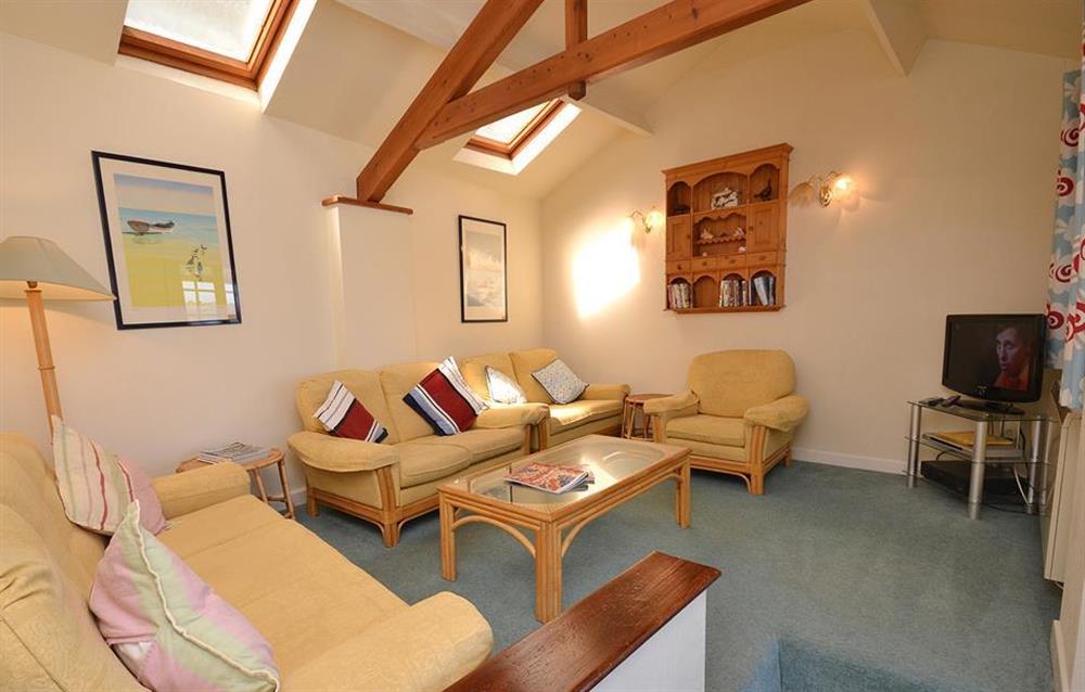 The light and sunny sitting room at The Old Bakehouse, Dittisham