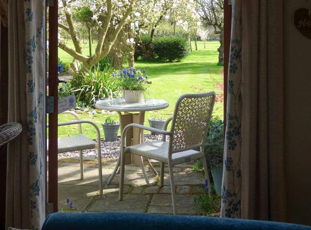 Charming ptio area overlooking the garden at The Old Bakery in Langham, near Colchester, Essex