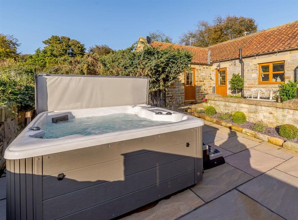 Hot tub at The Old Barn in Cloughton, near Scarborough, North Yorkshire