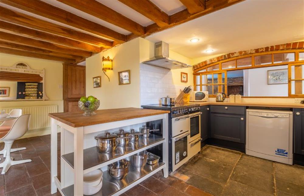 Kitchen with dishwasher and range style oven at The Old Barn, Semer