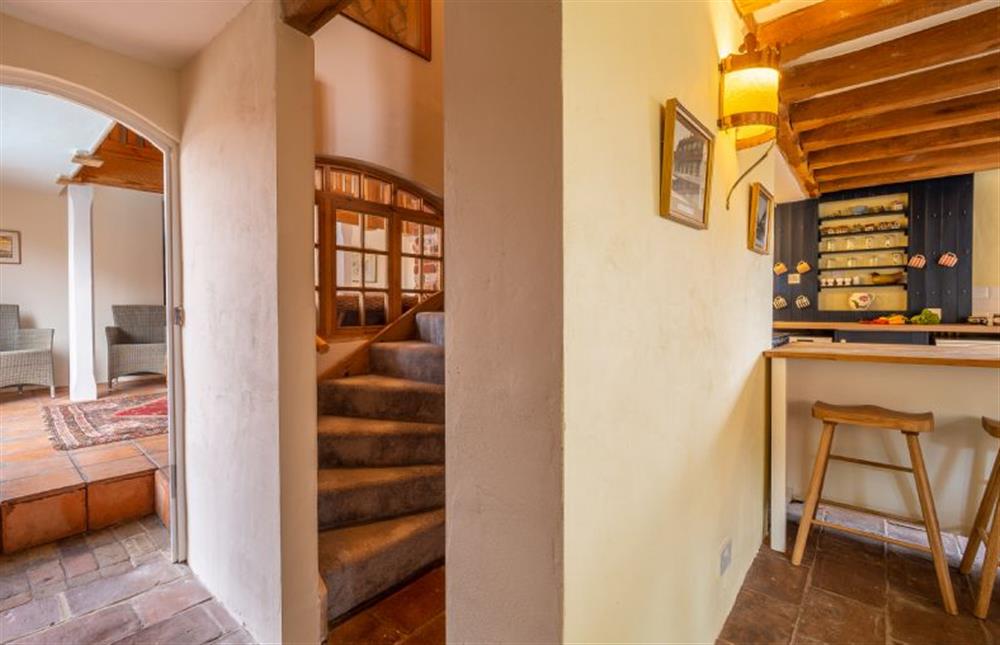 Kitchen with stairs to first floor at The Old Barn, Semer