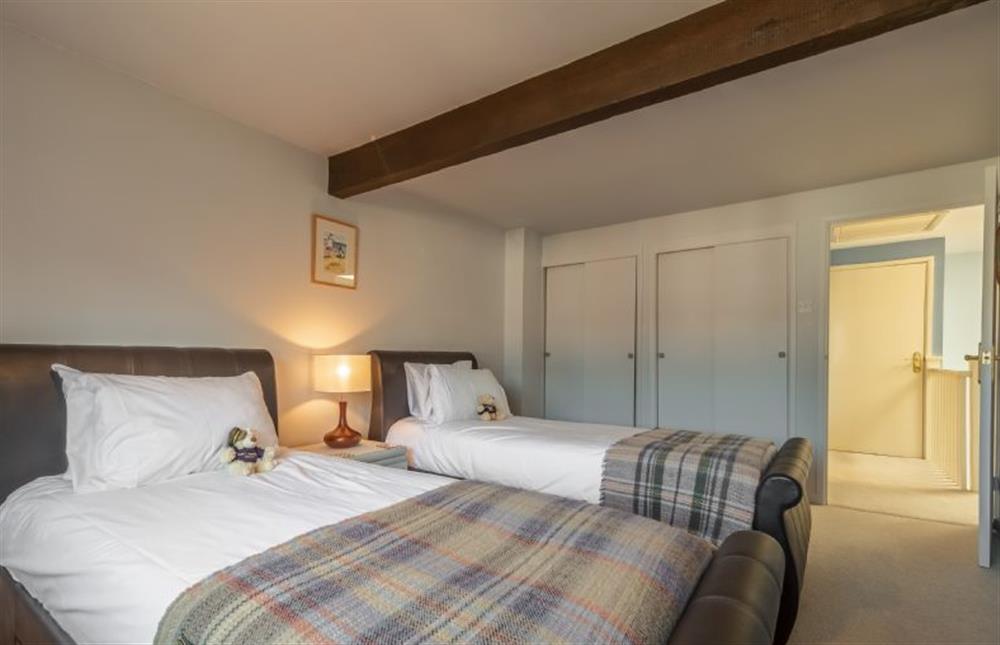 First floor: Bedroom three at The Old Barn, Weybourne near Holt