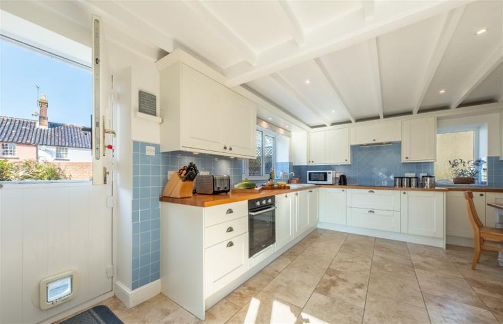 Ground floor: Kitchen with stable door to the garden at The Old Barn, Weybourne near Holt