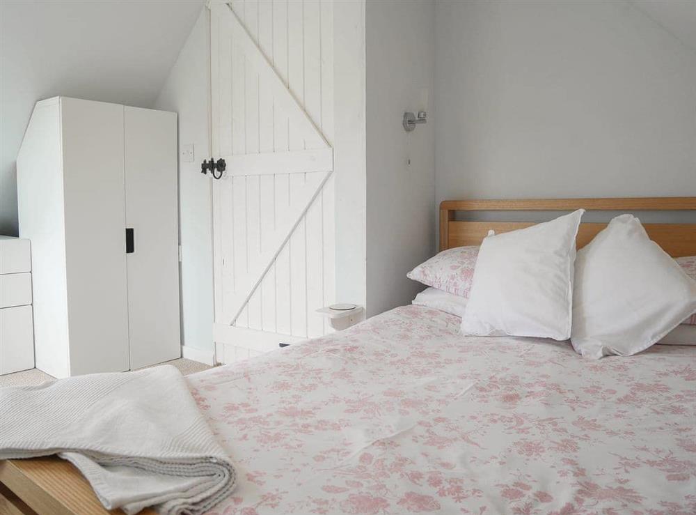 Comfortable double bedroom at The Old Boathouse in Portland Bill, near Portland, Dorset