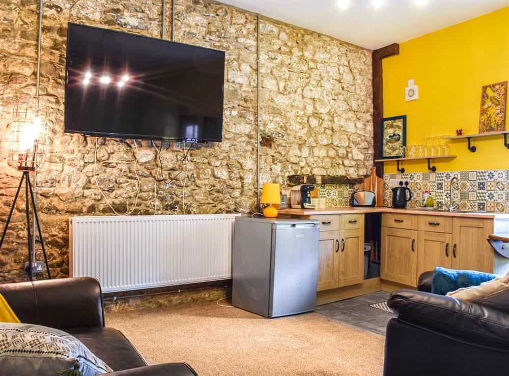 Open plan living space at The Old Boot Room in Llanfynydd, Dyfed