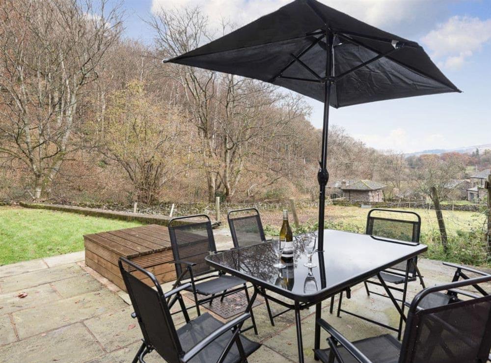 Outdoor seating area with great views at The Old Bothy in Watermillock, near Ullswater, Cumbria