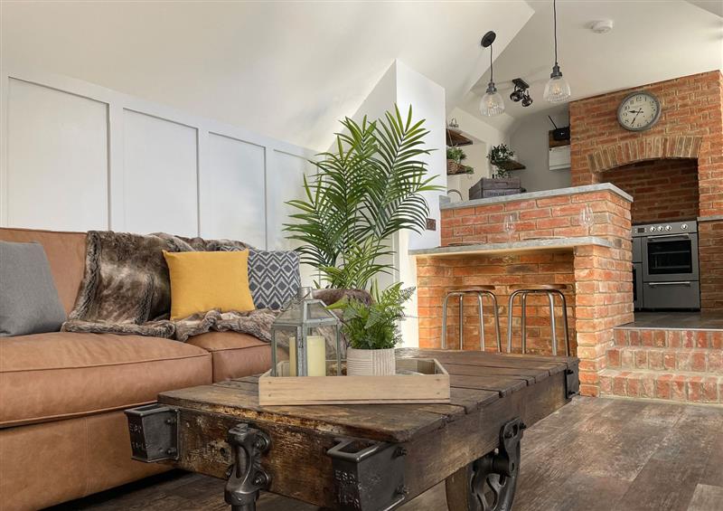 Relax in the living area at The Old Brewhouse & Piggery, Ningwood near Shalfleet