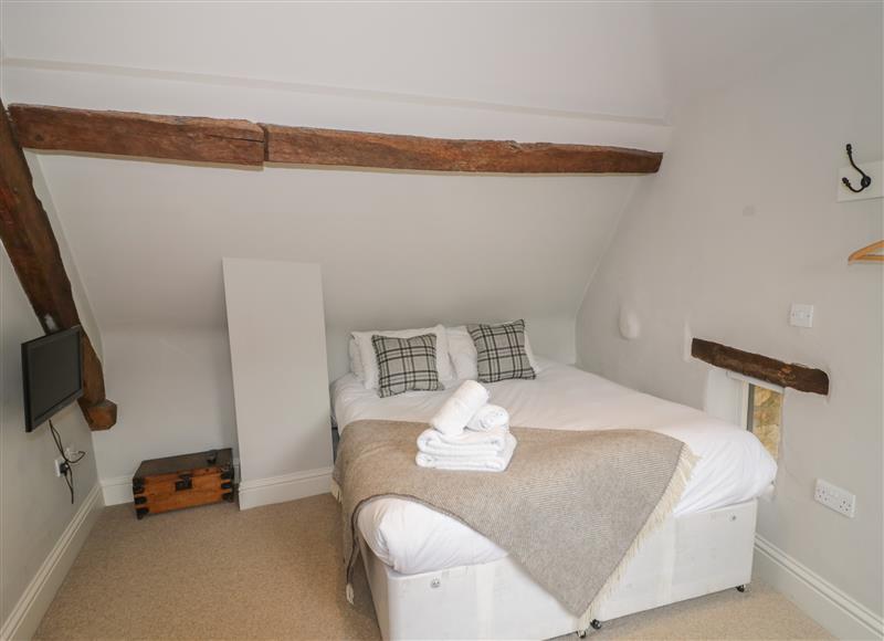 A bedroom in The Old Brewhouse at The Old Brewhouse, Chipping Campden