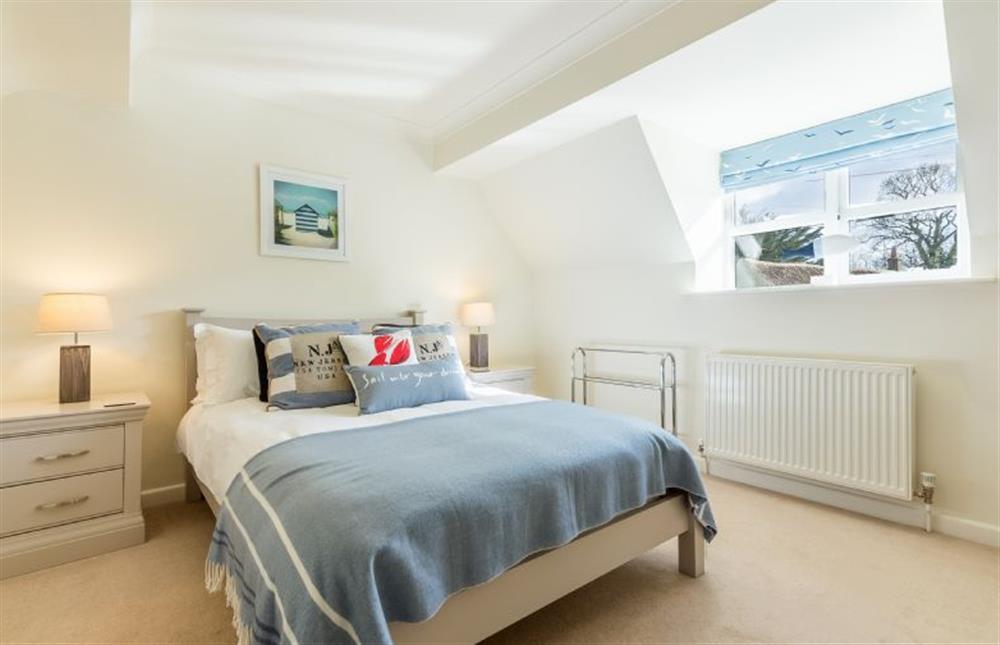 First floor: Bedroom two has double bed at The Old Butchers Shop, Docking near Kings Lynn