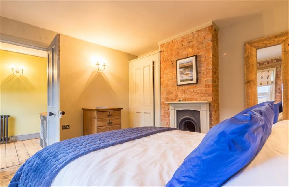 First floor: Bedroom one, master bedroom at The Old Butchers Shop, Heacham near Kings Lynn