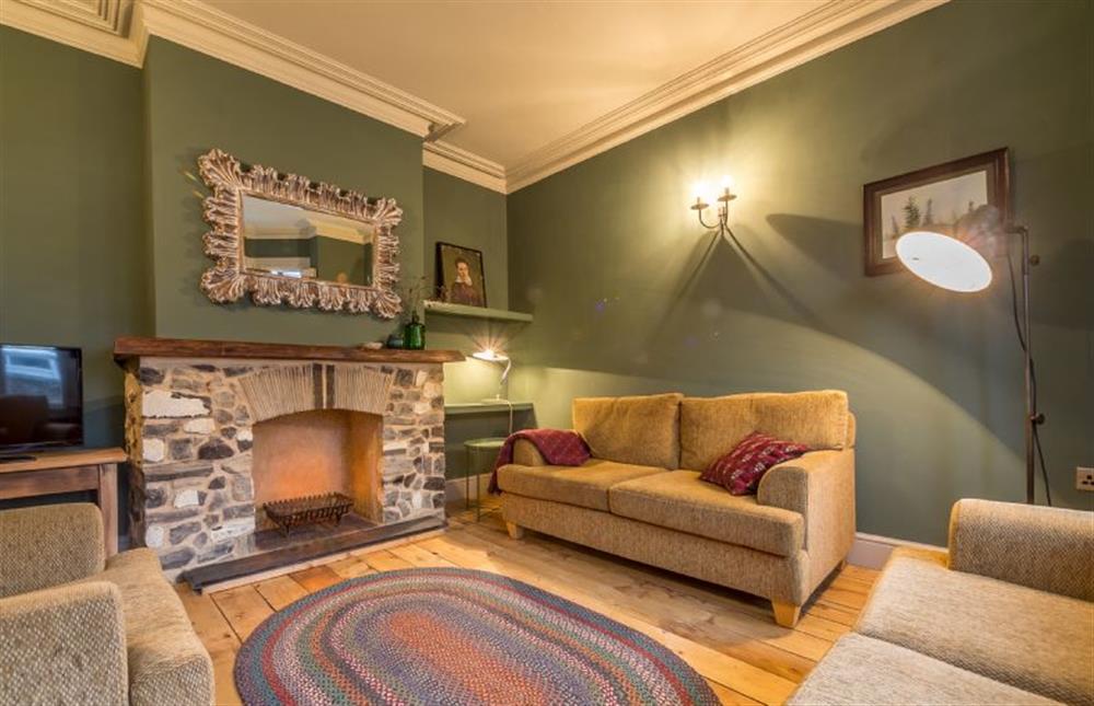 Ground floor: The sitting room has a feature fireplace