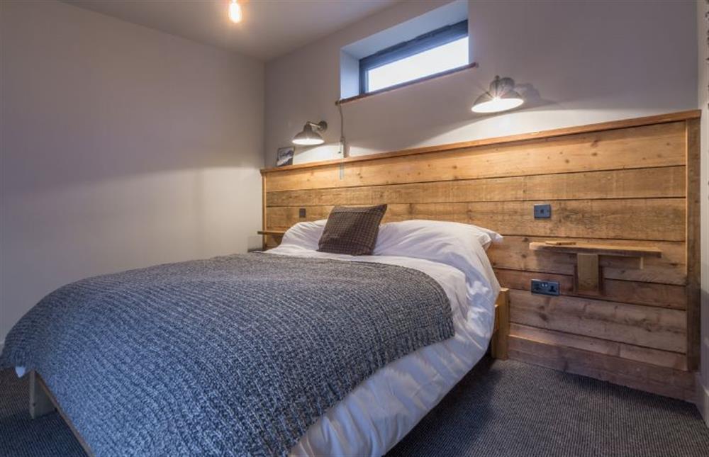 Ground floor: Bedroom two has comfortable double  bed at The Old Butchers Stores, Heacham near Kings Lynn