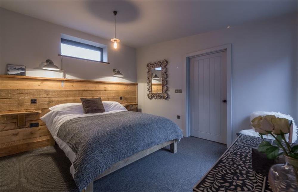 Ground floor: Bedroom two has double  bed at The Old Butchers Stores, Heacham near Kings Lynn